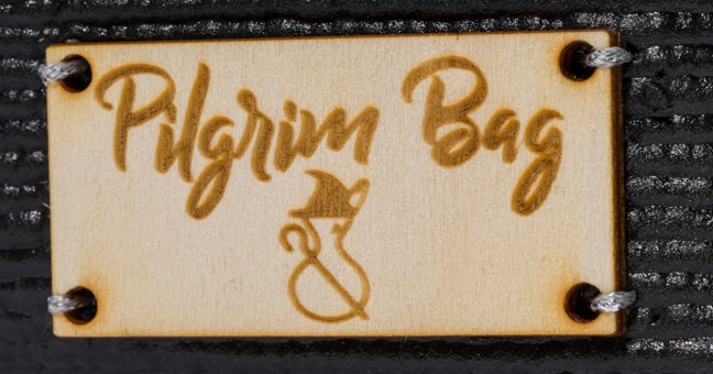 Chapita met&aacute;lica ovalada